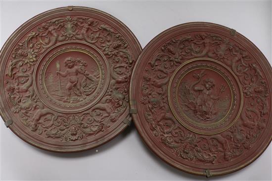 A pair of late 19th century French ceramic wall plaques, by J Marrech, 12.5in.